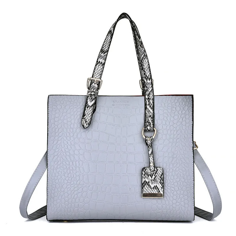 Women's solid colour diagonal cross body stone tote bag in black, 25x29x10cm, PU fabric with crocodile pattern