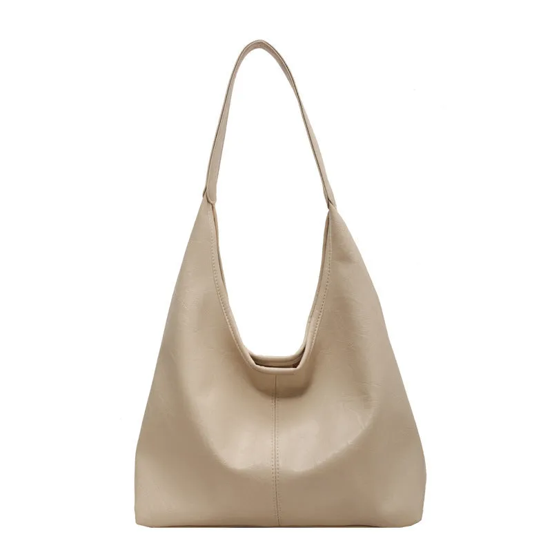 Women's large capacity PU shoulder tote bag in brown with sewing line detail and single strap