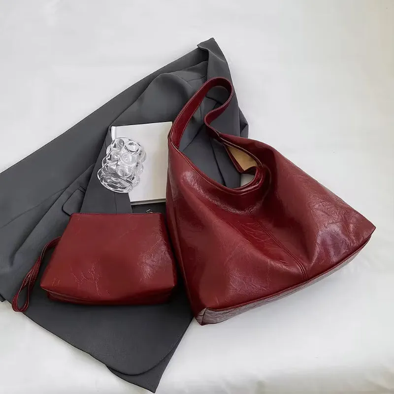 Women's large capacity PU shoulder tote bag in brown with sewing line detail and single strap