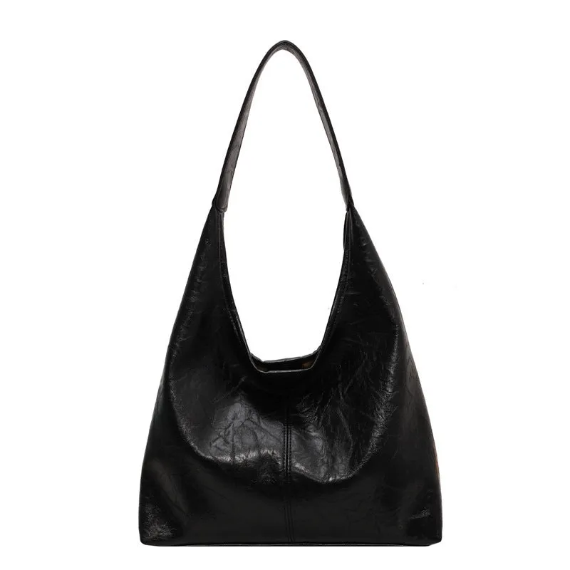Women's large capacity PU shoulder tote bag in brown with sewing line detail and single strap