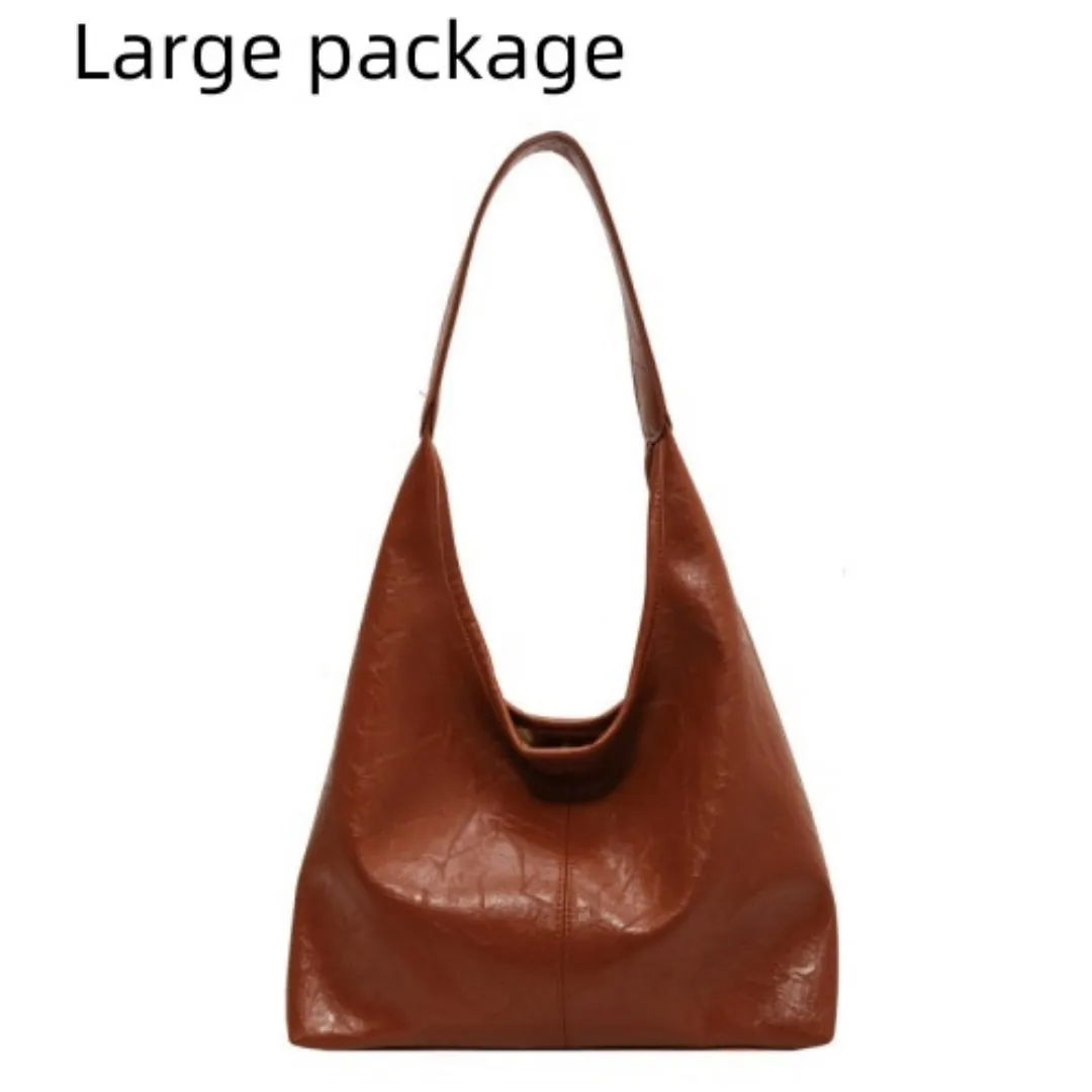 Women's large capacity PU shoulder tote bag in brown with sewing line detail and single strap