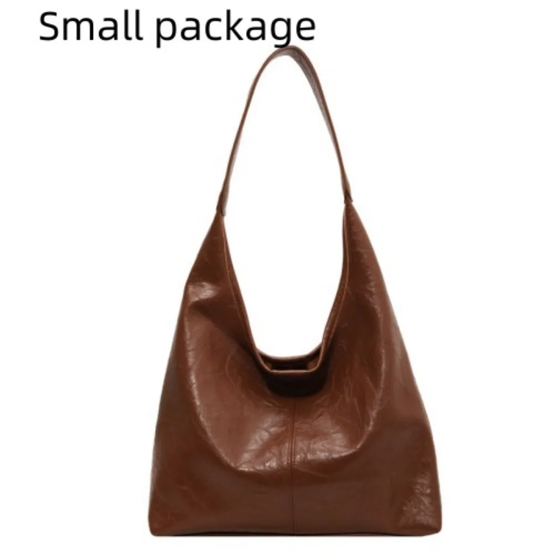 Women's large capacity PU shoulder tote bag in brown with sewing line detail and single strap