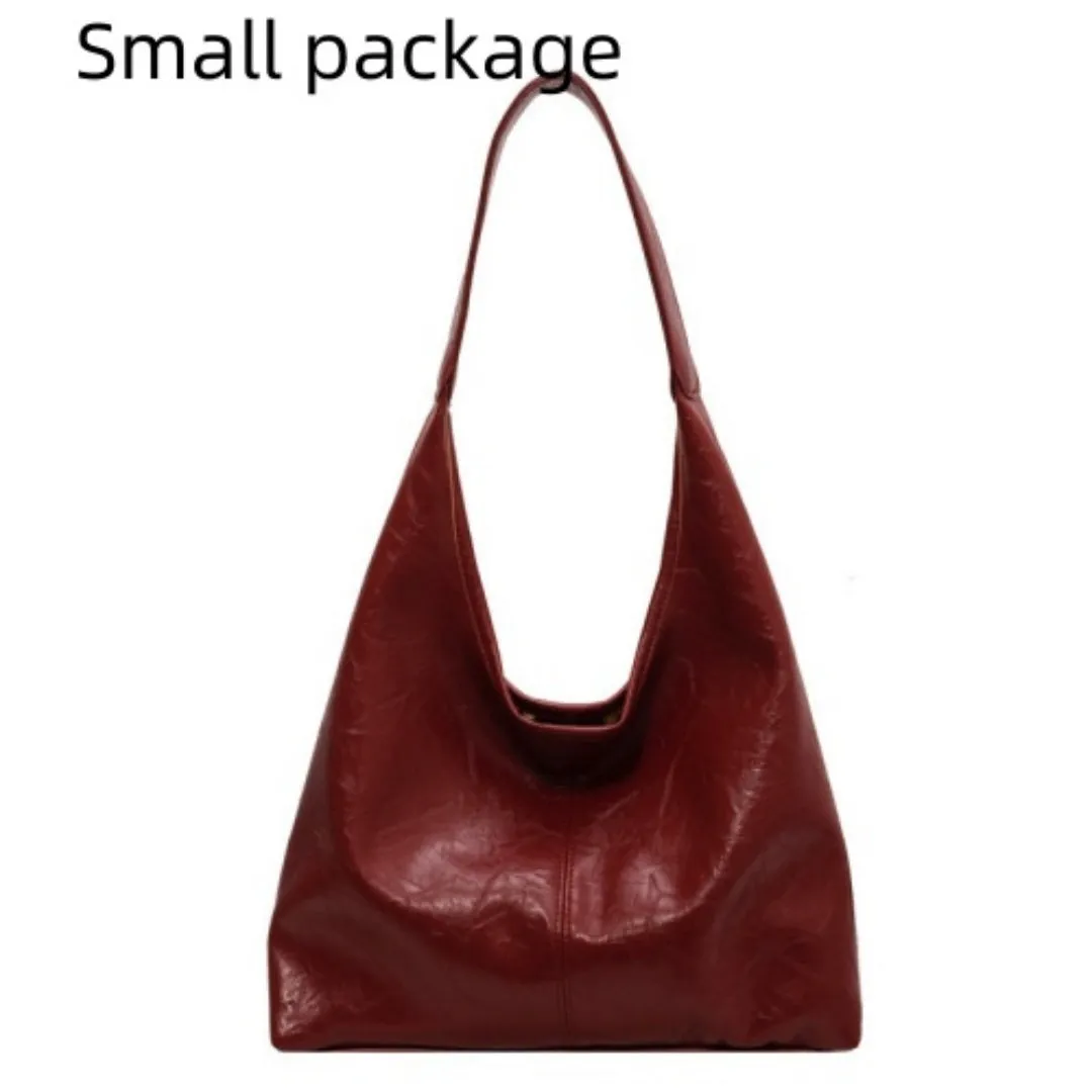 Women's large capacity PU shoulder tote bag in brown with sewing line detail and single strap