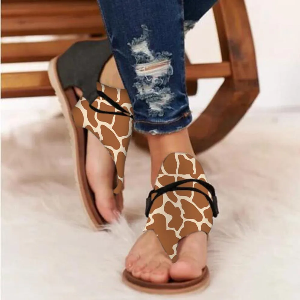 Women's flat cushioned sandals with synthetic upper and rubber outsole in multiple colour options