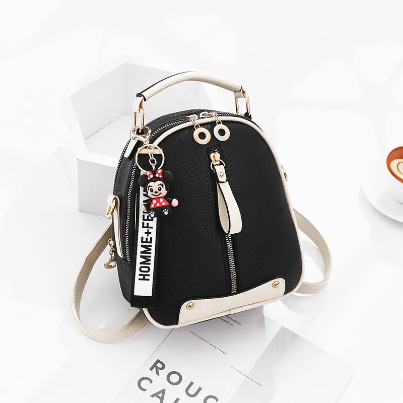 Fashion backpack for women in PU leather oval shape with double shoulder straps and car suture detail