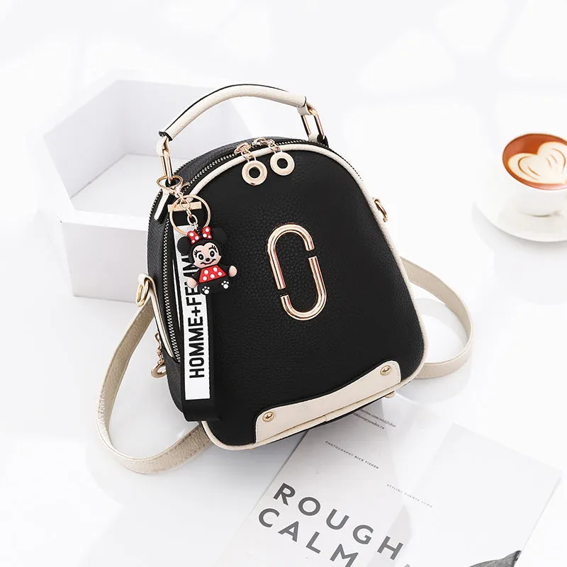 Fashion backpack for women in PU leather oval shape with double shoulder straps and car suture detail