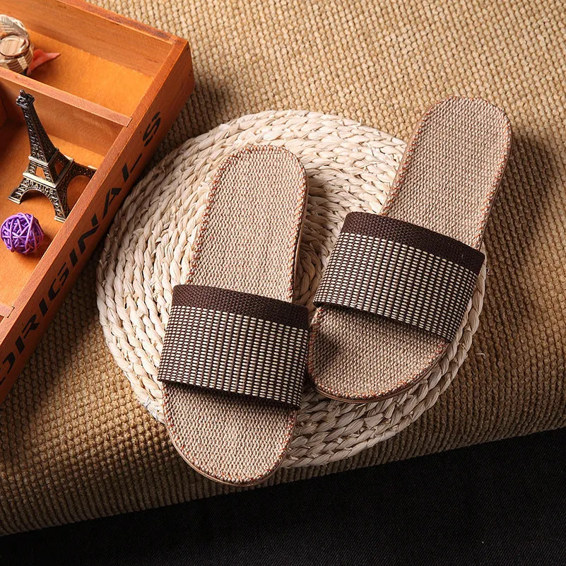 Linen open-toe home slippers with EVA sole in woven blue colour on a light background