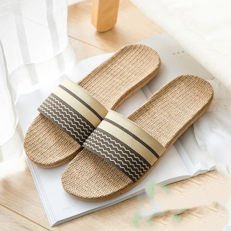 Linen open-toe home slippers with EVA sole in woven blue colour on a light background