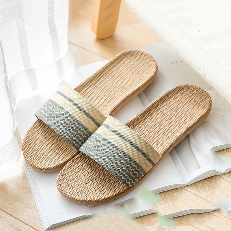 Linen open-toe home slippers with EVA sole in woven blue colour on a light background