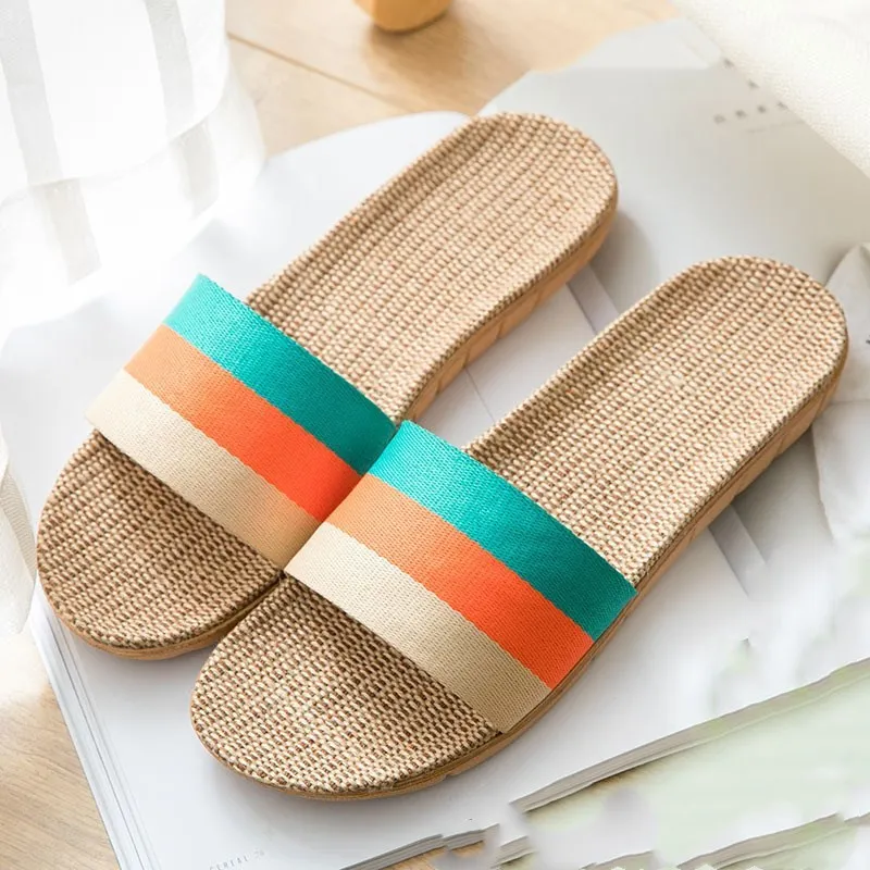 Linen open-toe home slippers with EVA sole in woven blue colour on a light background