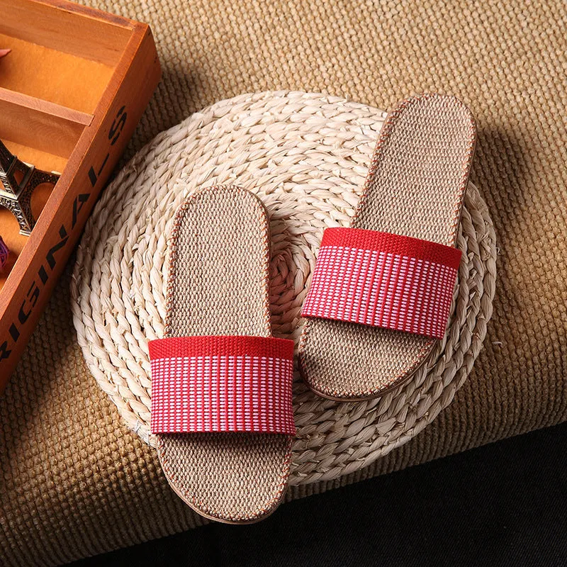 Linen open-toe home slippers with EVA sole in woven blue colour on a light background