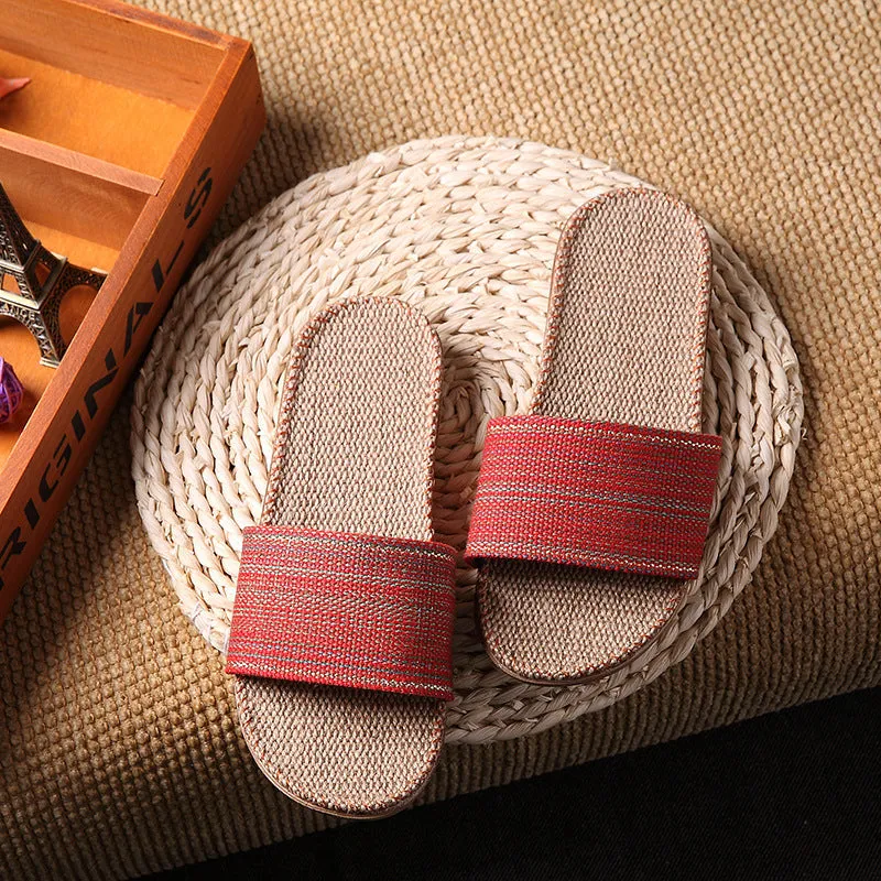 Linen open-toe home slippers with EVA sole in woven blue colour on a light background
