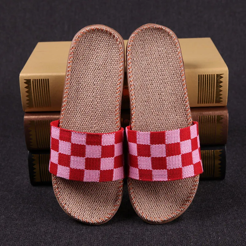 Linen open-toe home slippers with EVA sole in woven blue colour on a light background