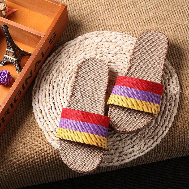 Linen open-toe home slippers with EVA sole in woven blue colour on a light background