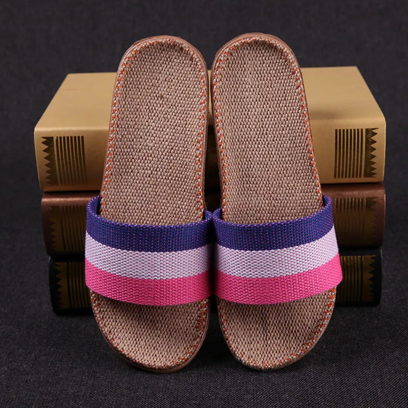 Linen open-toe home slippers with EVA sole in woven blue colour on a light background