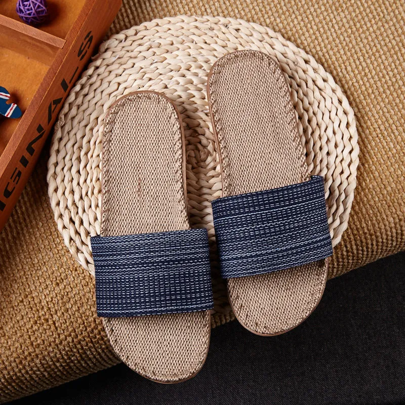 Linen open-toe home slippers with EVA sole in woven blue colour on a light background