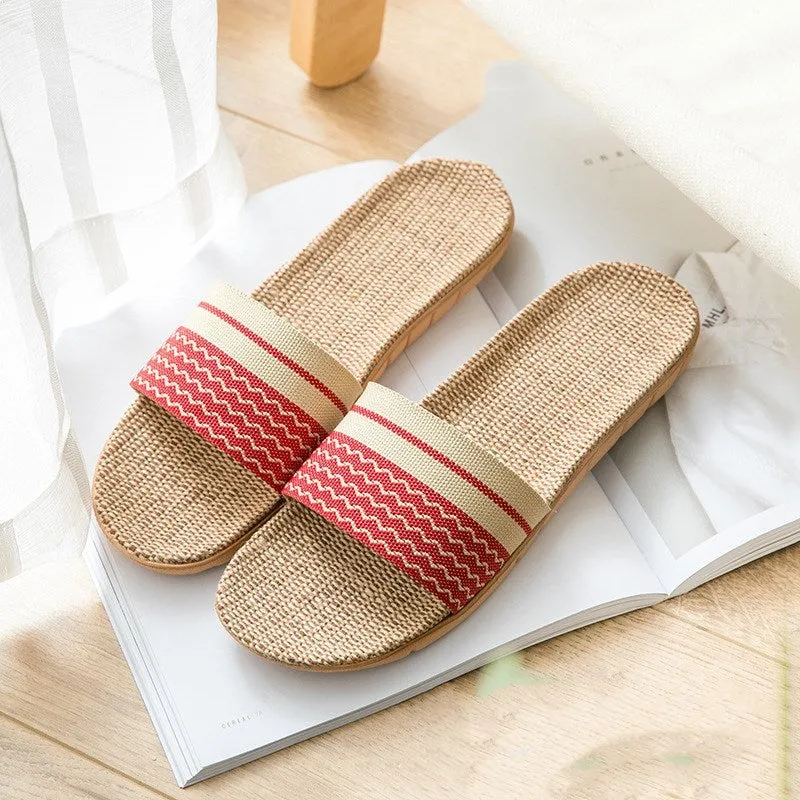 Linen open-toe home slippers with EVA sole in woven blue colour on a light background