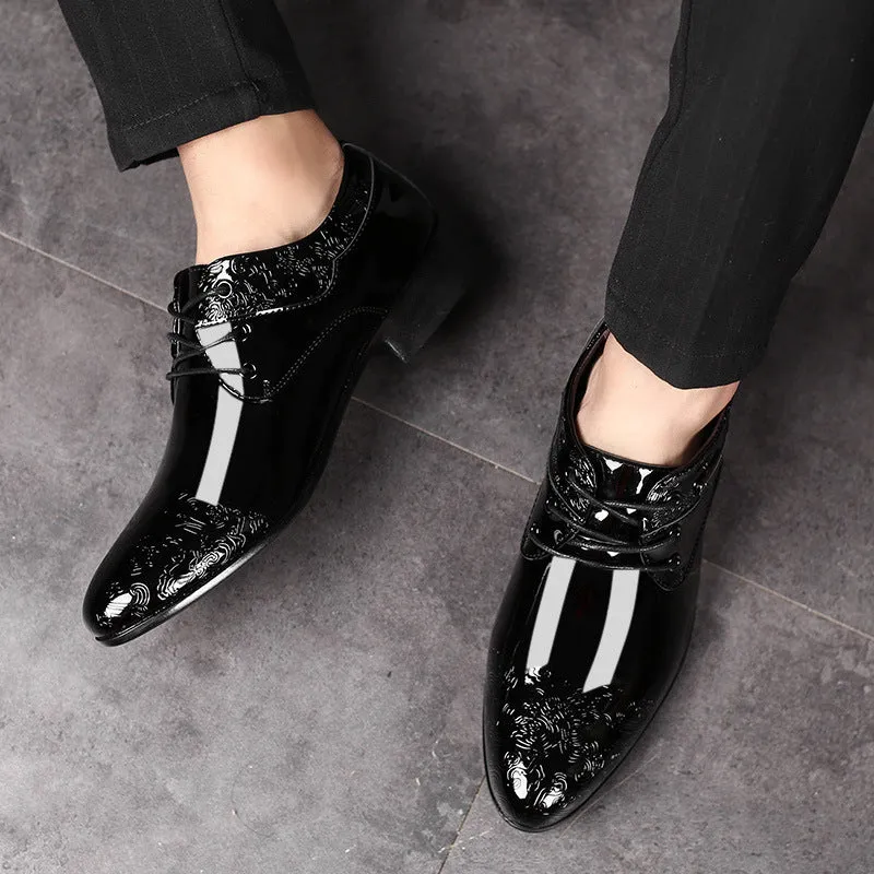 Men's glossy black patent leather formal shoes with pointed toe and carved detail, low top style