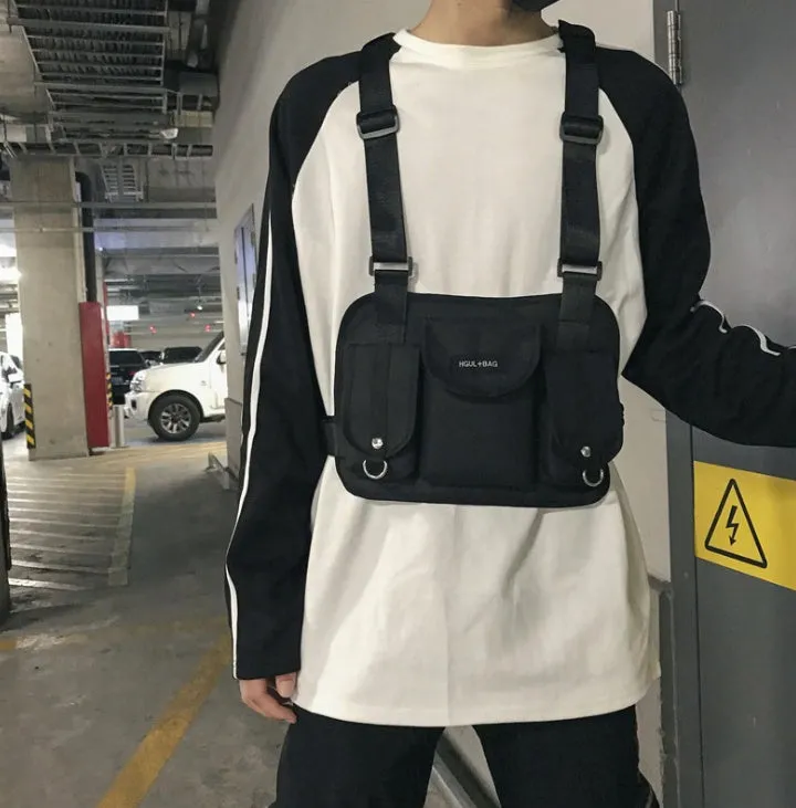 Nylon casual sports backpack in black with curved shoulder straps and plain finish, 20-35L capacity