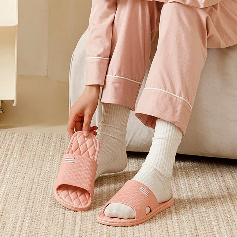 Anti-slip lozenge texture PVC home slippers in solid colours for indoor summer wear