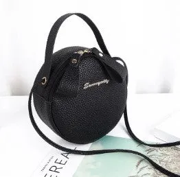 Women's round PU leather crossbody bag in circular shape, 17cm wide, with separate pouch