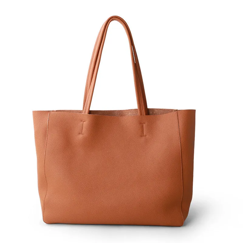 Large first layer cowhide leather tote bag with soft handle, plain design with car stitching, available in multiple colours