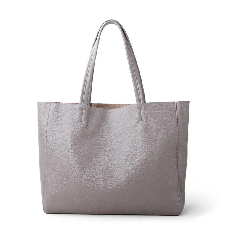 Large first layer cowhide leather tote bag with soft handle, plain design with car stitching, available in multiple colours