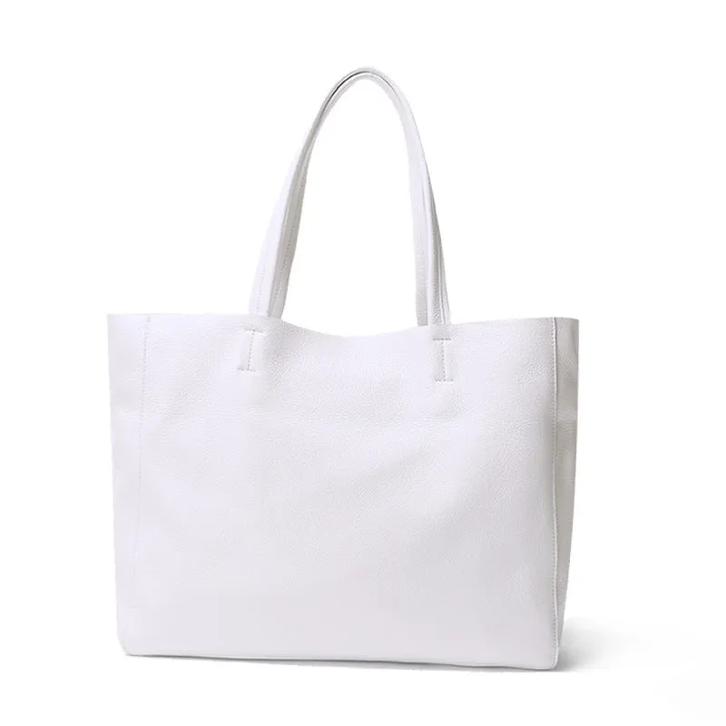 Large first layer cowhide leather tote bag with soft handle, plain design with car stitching, available in multiple colours