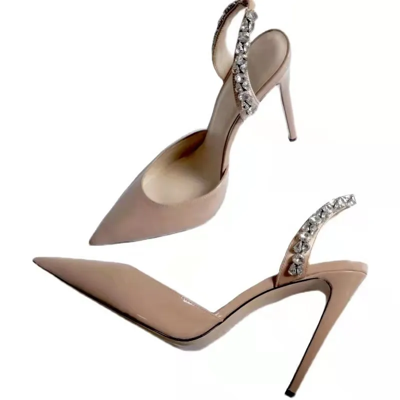 Women's black patent leather rhinestone pointed toe high heel sandals on a white background.