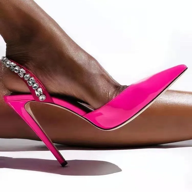 Women's black patent leather rhinestone pointed toe high heel sandals on a white background.