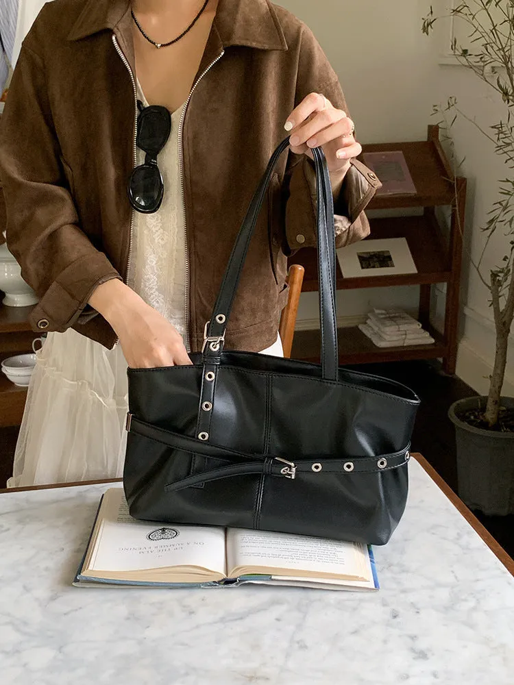 Women's large capacity PU shoulder bag in black with visible sewing line detail and horizontal square shape
