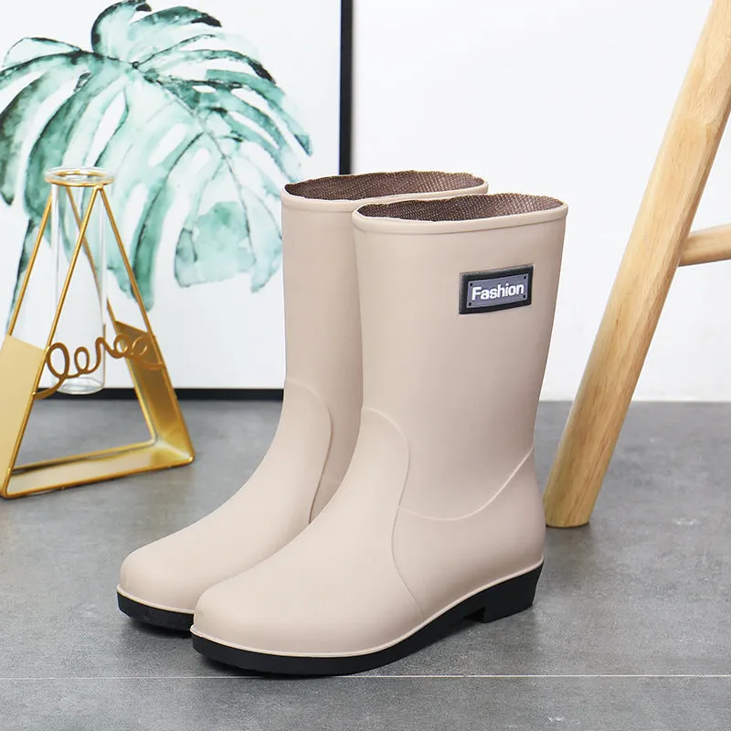 Women's mid-calf rain boots in PVC material with low heel for waterproof work wear