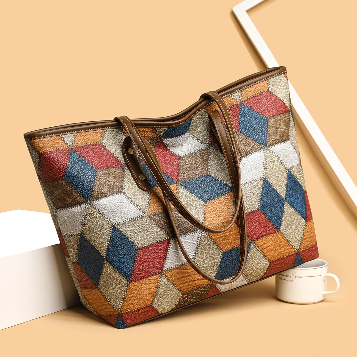 Women's large capacity PVC shoulder handbag in blue brown colour with sandwich pocket organisation