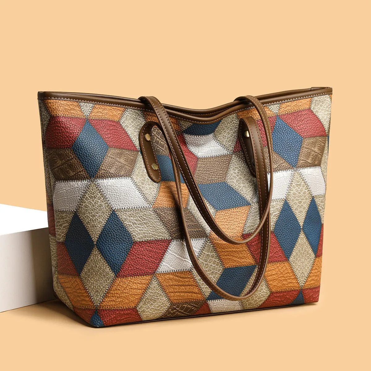 Women's large capacity PVC shoulder handbag in blue brown colour with sandwich pocket organisation