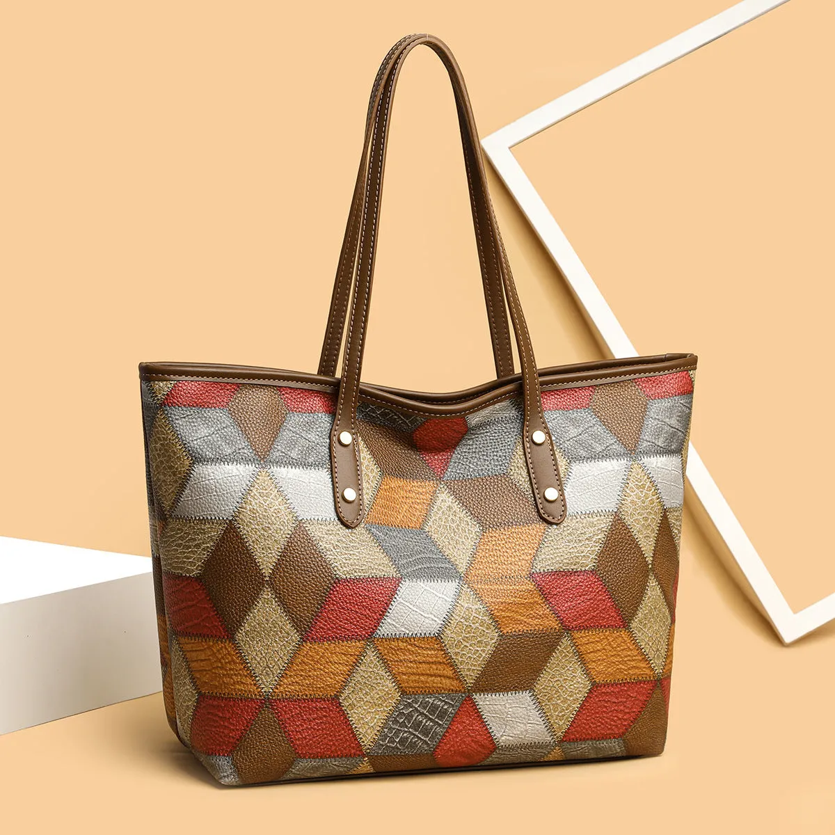 Women's large capacity PVC shoulder handbag in blue brown colour with sandwich pocket organisation