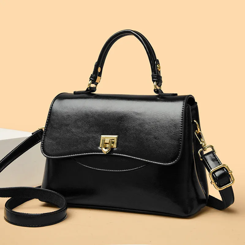 Women's large-capacity soft PU shoulder tote bag in black with horizontal square shape and sewing line detail