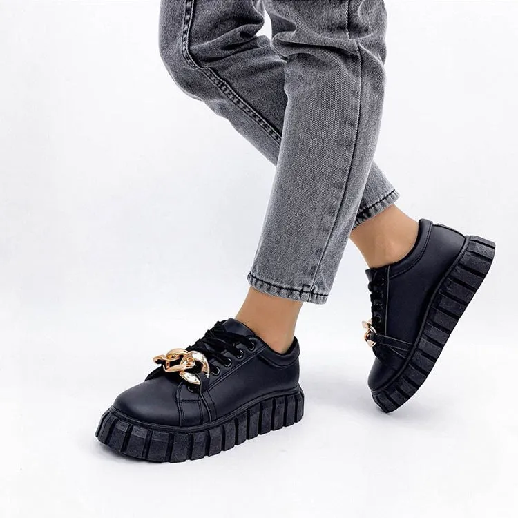 Low-top flat casual sneakers in artificial PU with rubber sole and front lace closure