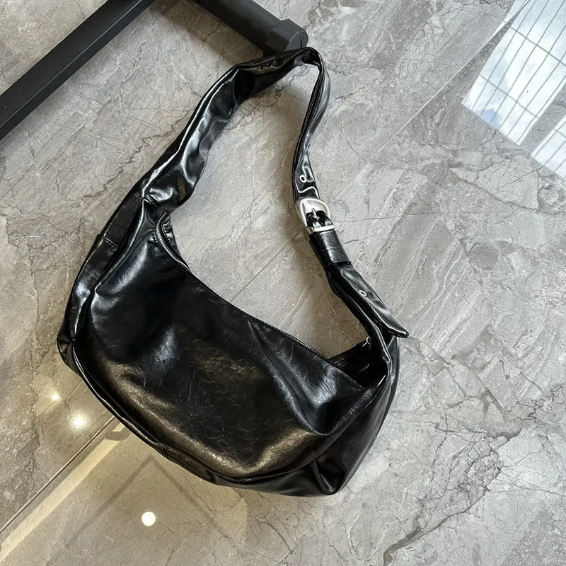 Soft PU large capacity commuter shoulder bag in black, horizontal square shape, with single shoulder strap