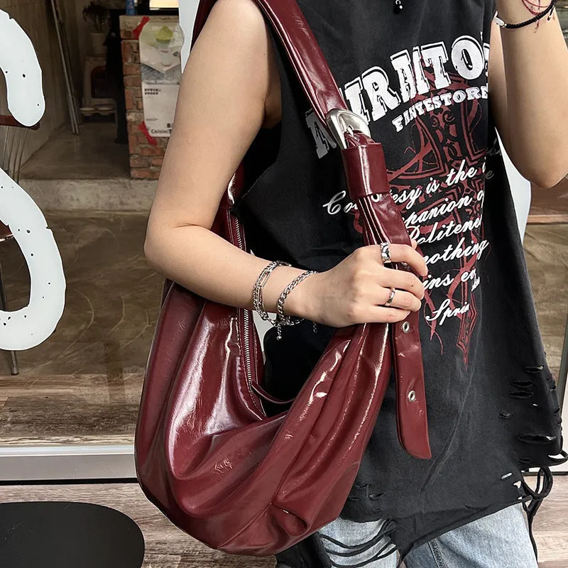 Soft PU large capacity commuter shoulder bag in black, horizontal square shape, with single shoulder strap