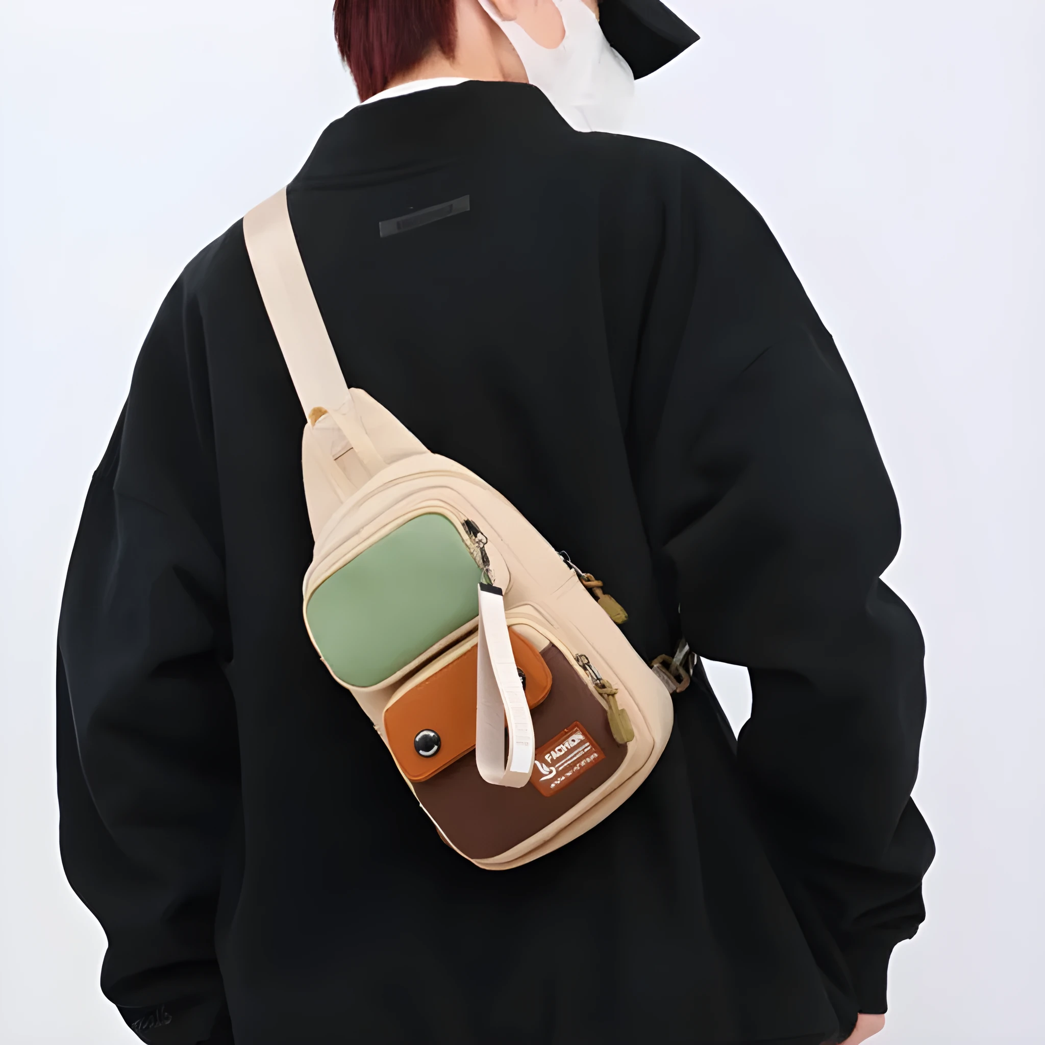 Outdoor crossbody shoulder bag in nylon with contrast colour options and multiple storage compartments