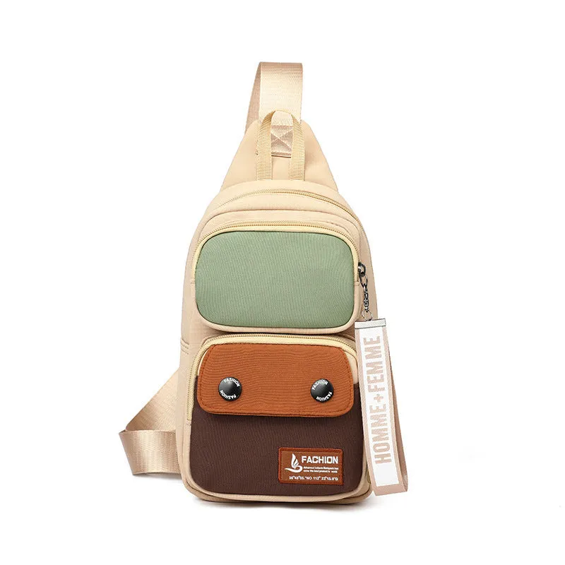 Outdoor crossbody shoulder bag in nylon with contrast colour options and multiple storage compartments