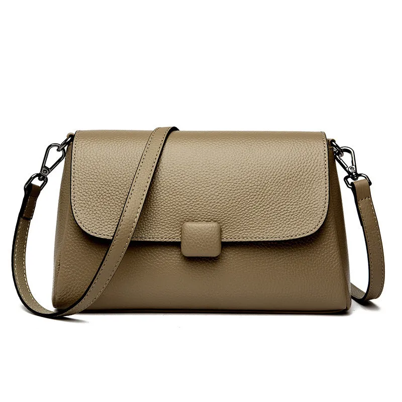Genuine first-layer cowhide leather shoulder bag in horizontal square shape, 26x16x9cm, black colour, with top zipper and sandwich pocket
