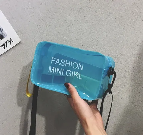 A transparent square jelly cross-body bag in a choice of colours, shown with an adjustable strap and a mobile phone inside.