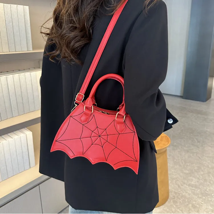 Women's small square PU saddle bag with spider web pattern, crossbody strap, and top handle, available in six colours including black and red