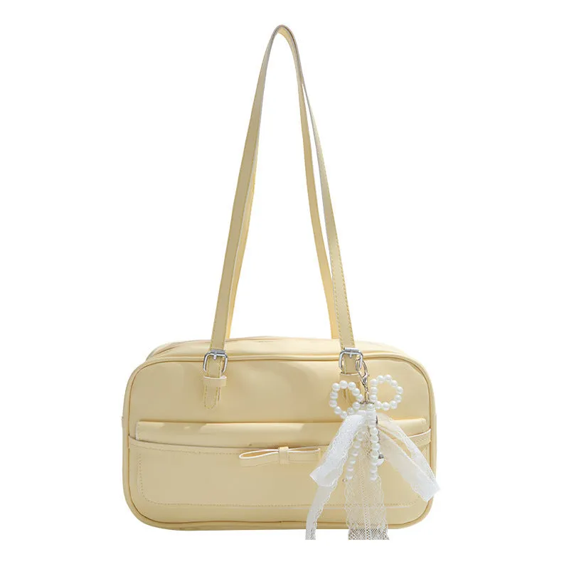 Women's PU leather single shoulder bag in horizontal square shape with flap closure and double straps