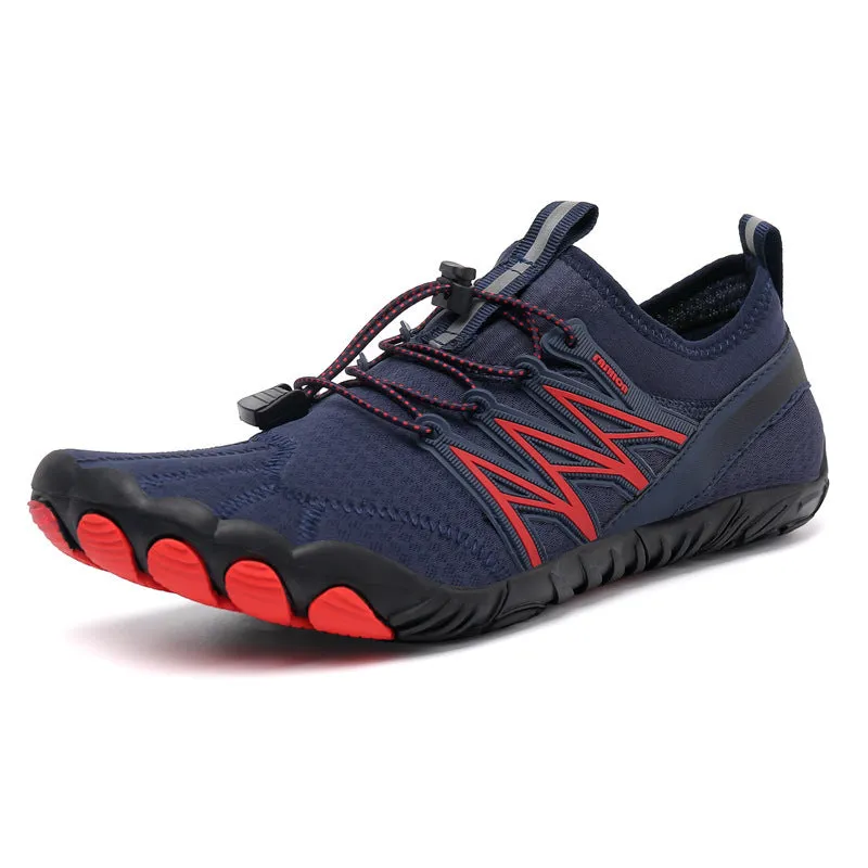 Low-top striped training sneakers with a flat rubber sole, shown in various colours including black and grey orange.