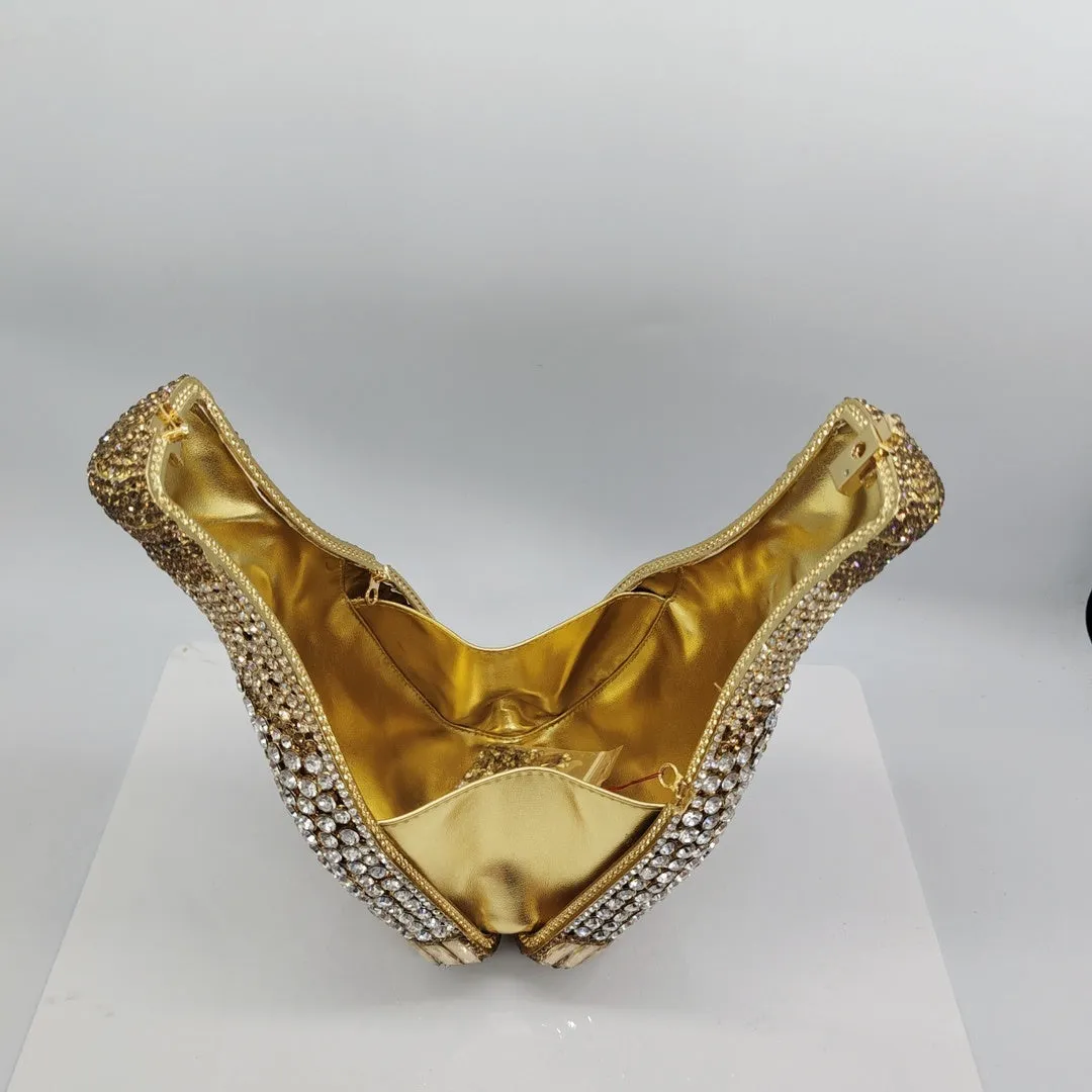 Gold hard evening clutch bag shaped like a champagne bottle with rhinestone decoration