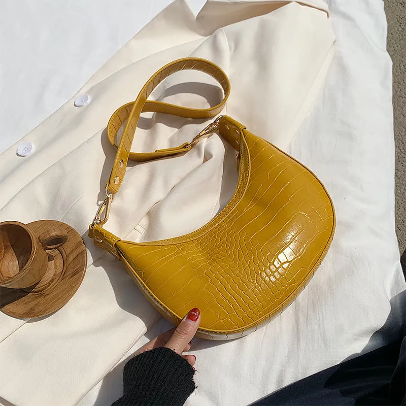 Fairy dumpling bag in PU with crossbody strap, 24cm wide, available in multiple colours
