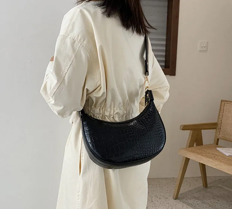 Fairy dumpling bag in PU with crossbody strap, 24cm wide, available in multiple colours