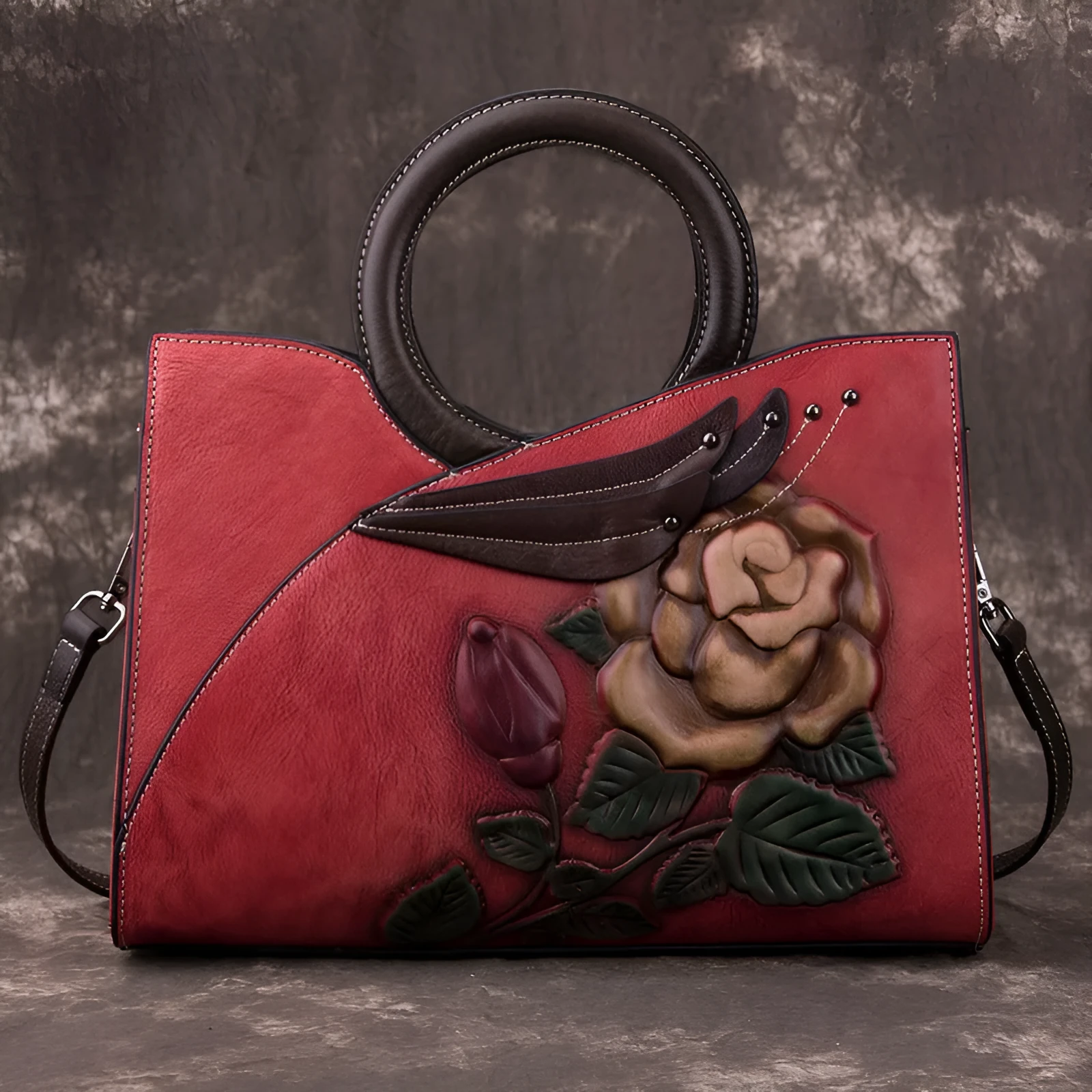Handmade genuine leather women's handbag in contrasting colour with floral elements and zipper closure